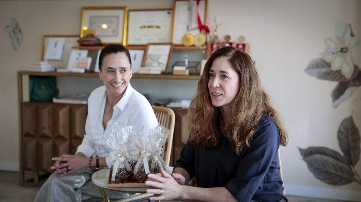Sisters Susana Garcia Nevett, left, and Isabel Garcia Nevett, right, share their passion for chocolate inside their South Miami shop, Garcia Nevett Chocolatier de Miami. The fine chocolate shop, recently named one of the best in the country, was photographed on Thursday, June 26, 2026, in South Miami, Fla.