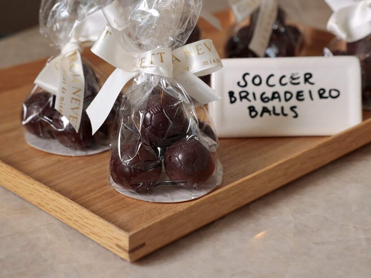 Pictured are packaged chocolate soccer balls at Garcia Nevett Chocolatier de Miami. The fine chocolate shop, recently named one of the best in the country, was photographed on Thursday, June 26, 2026, in South Miami, Fla.