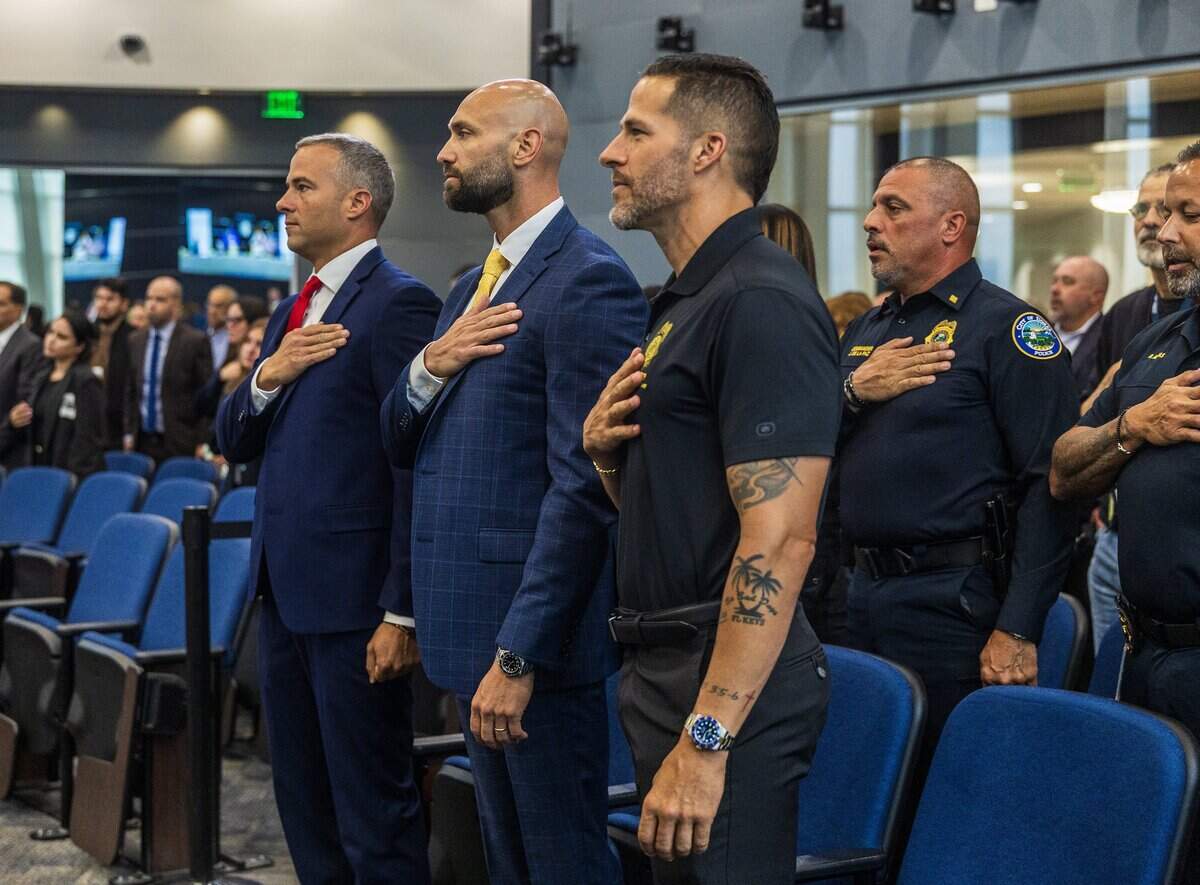 Current City of Doral Police Chief Edwin Lopez (far right-front row) joined newly appointed Police Chief Matthew Castillo (far left) and Deputy Chief of Police Jonathan Dweck, during a meeting where the City Council approved the Chief Castillo employment agreement and the current Police Chief Edwin Lopez appeared in front of the council before his departure, at City Hall, on Wednesday June 10, 2026.