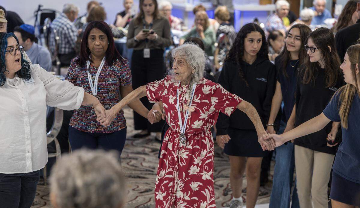 Esther Weinglass, 84 y.o, took it to the dance floor as she attended the Holocaust Survivor Day, hosted by the Goodman Jewish Family Services of Broward County in celebration for nearly 130 local Holocaust survivors, at Temple Beth Emet in Cooper City, Florida on Wednesday June 03 , 2026.