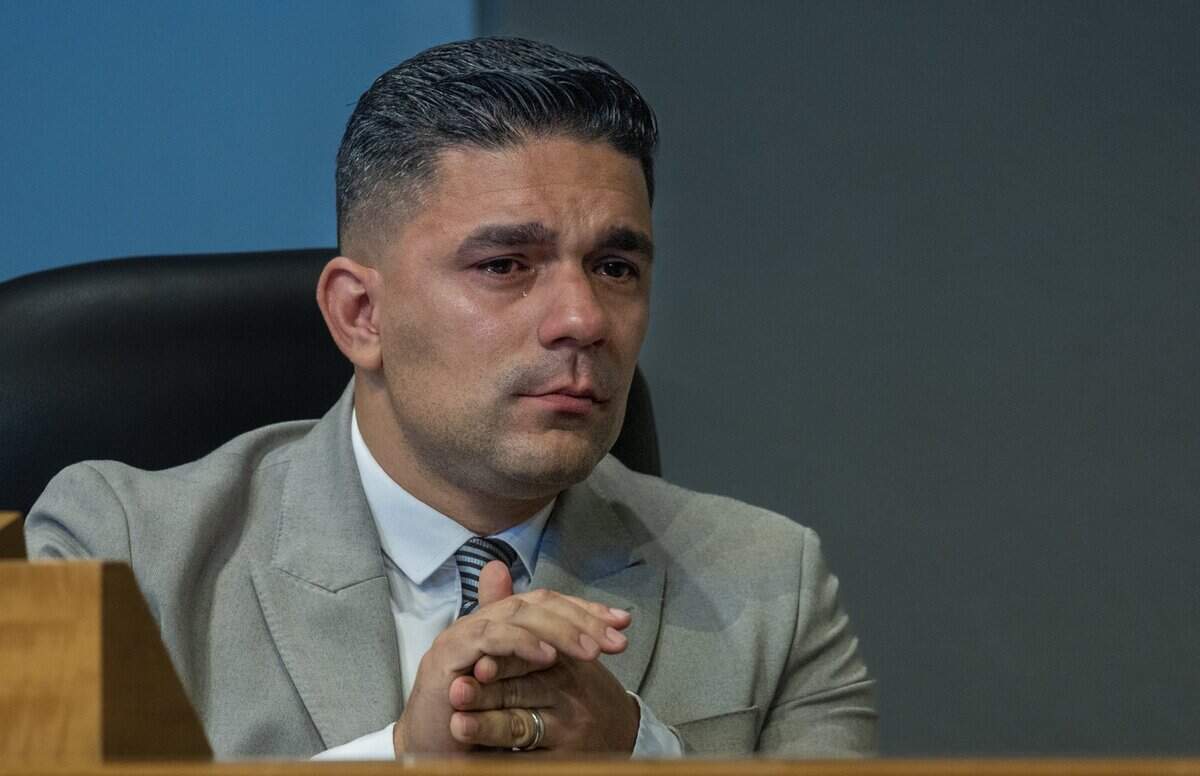 City of Miami Commissioner Rolando Escalona reacts after resident Billy Corben addressed him as while speaking against the 287(g) agreement with ICE that the commission voted in favor to enter into last year, during a Miami City Commission meeting, at City Hall, on Thursday June 25, 2026.