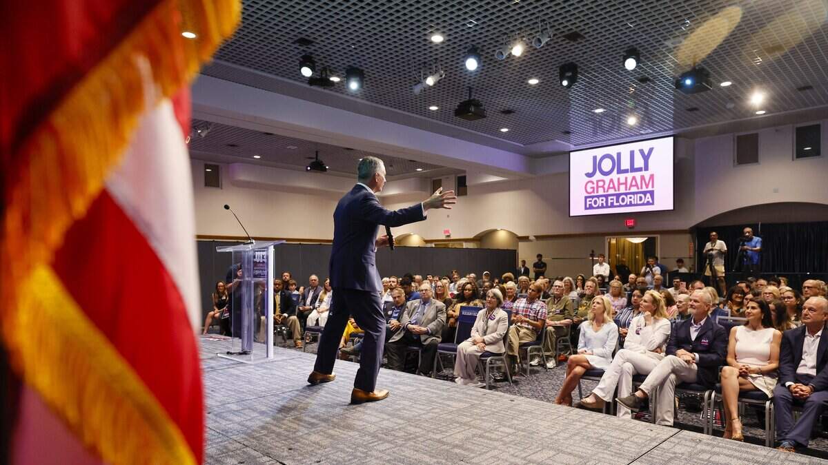 Democratic nominee for Florida governor, David Jolly, speaks during a campaign rally with running mate and former Congresswoman Gwen Graham at Florida International University Graham Center Ballroom in Miami on Florida, on Thursday, June 11, 2026.