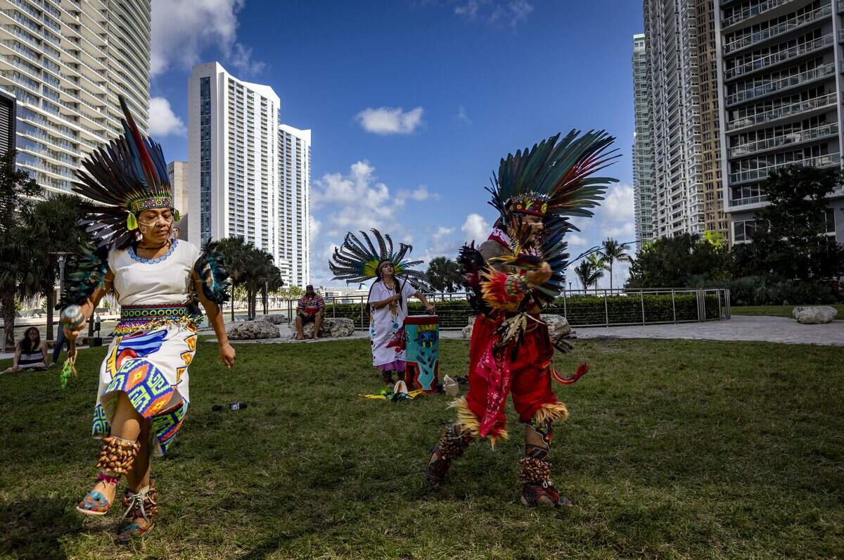 Members of the Nahuas indigenous people dance at the Miami Circle park in 2023 during a prayer gathering in support of the designation as a protected archaeological site of a newly uncovered Tequesta Indian habitation across Brickell Avenue on the Miami River.
