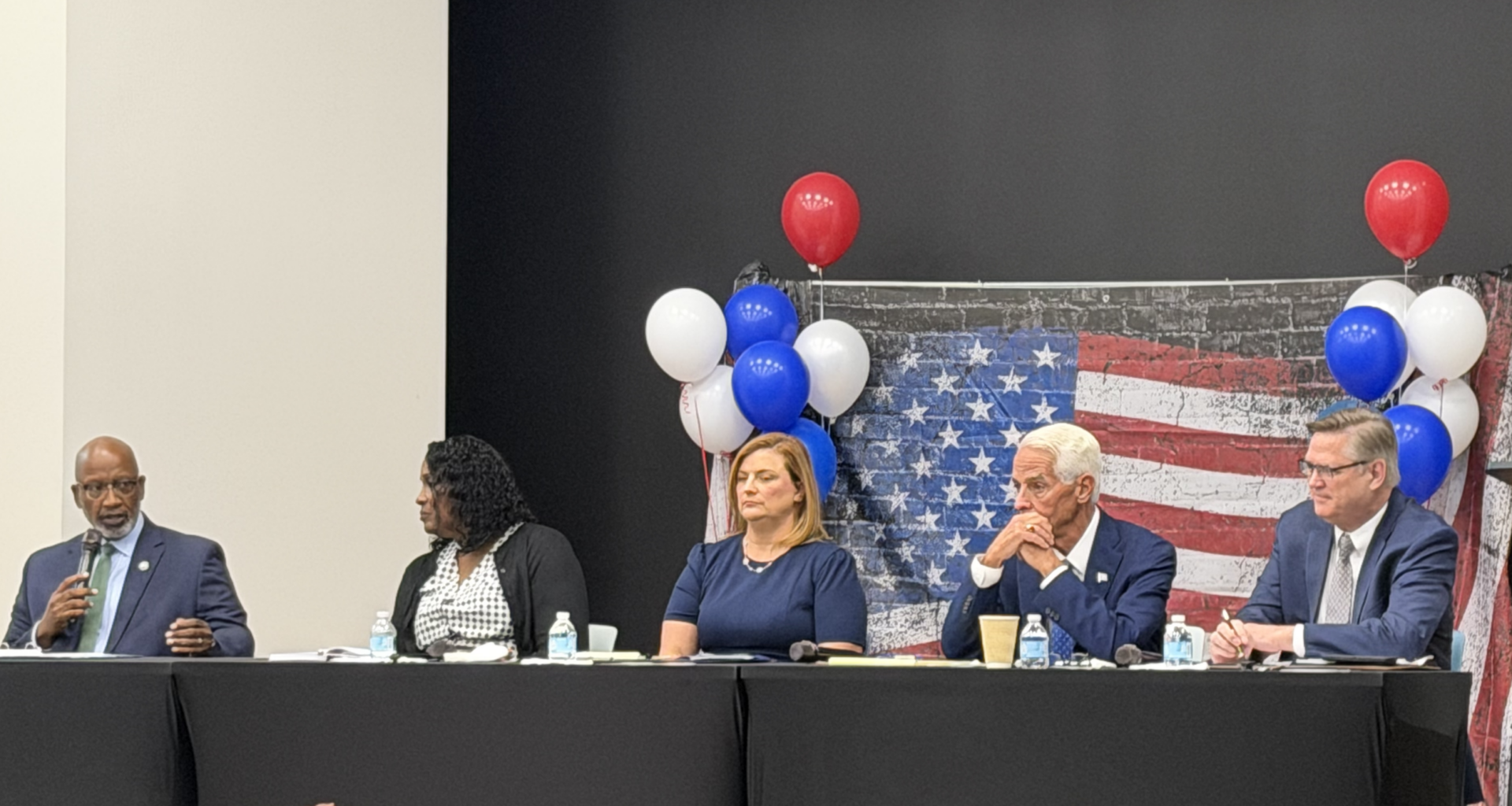 Welch spends first mayoral debate defending his record