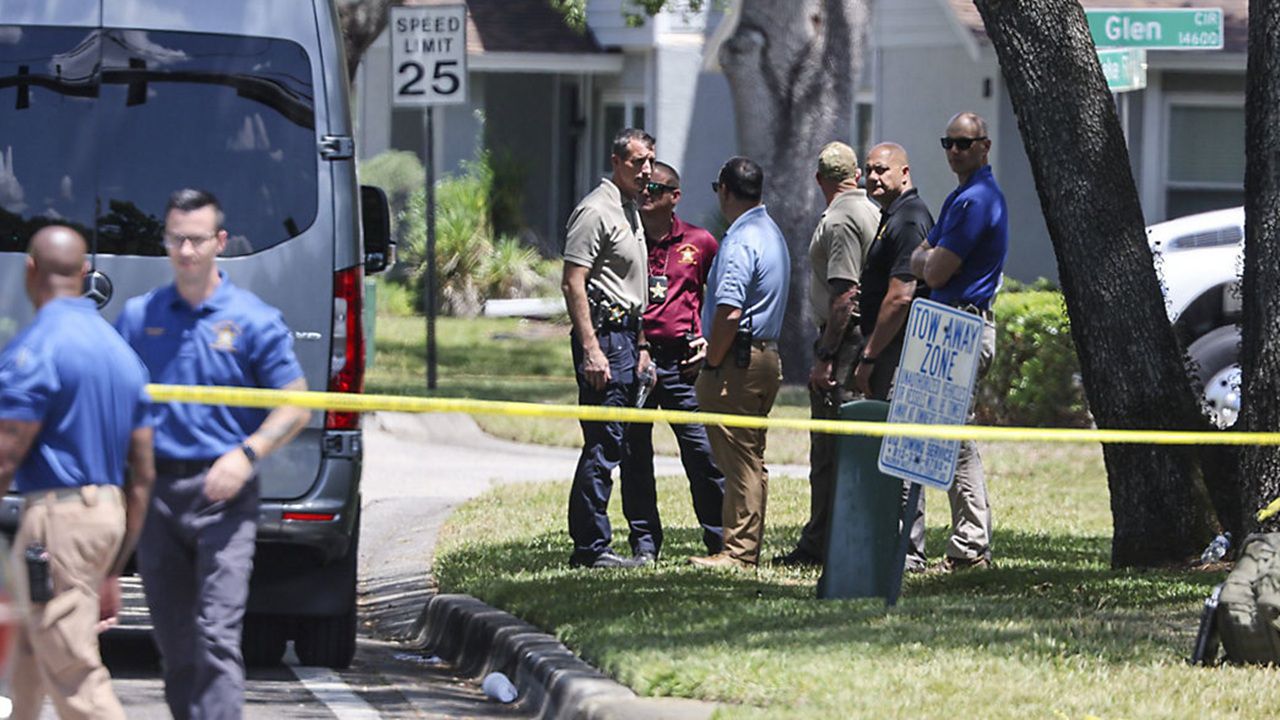 Detectives with the Hillsborough County Sheriff’s Office joined an investigation inside the Lake Forest subdivision on April 24, where authorities took Hisham Saleh Abugharbieh into custody after the deaths of two graduate students. (Douglas R. Clifford/Associated Press)