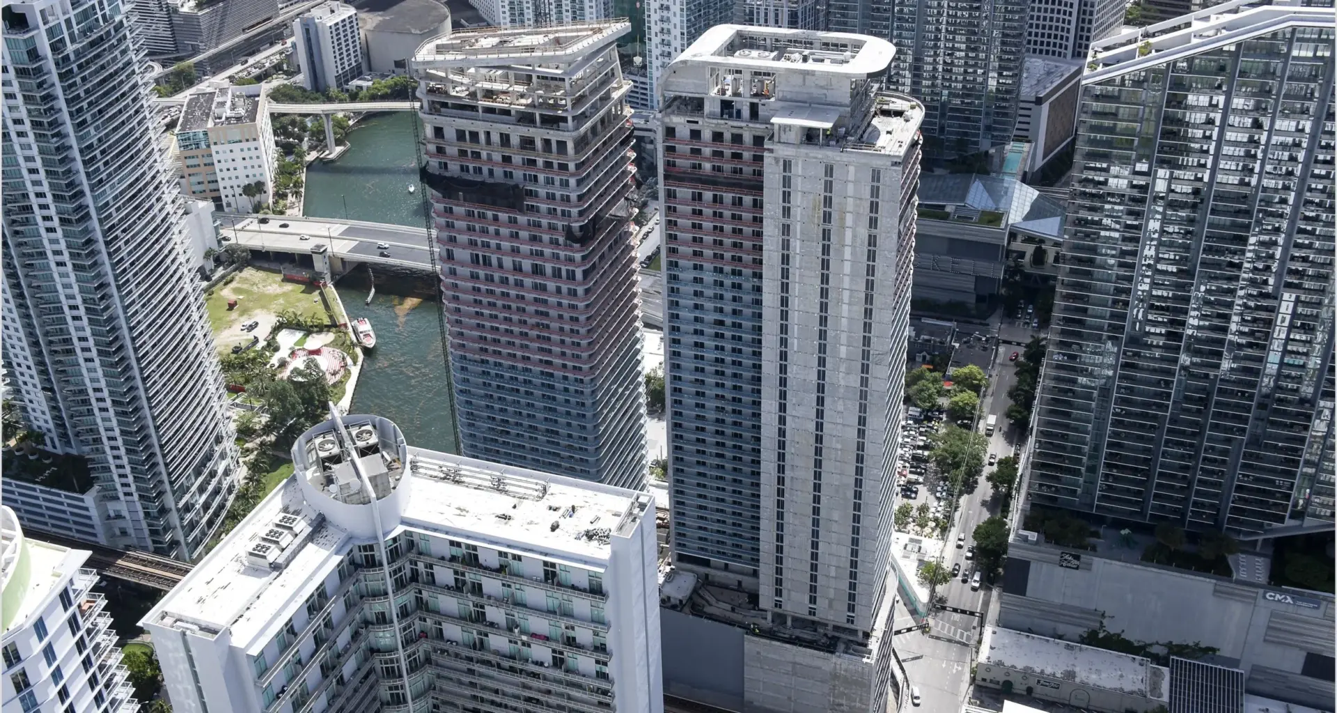 Newgard Group and Two Roads Development Mark Major Construction Milestone at One Brickell Riverfront With Installation of Architectural Crowns — PROFILEmiami South Florida Real Estate and Lifestyle