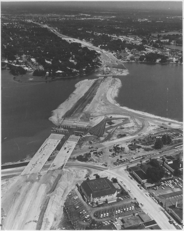 The Interstate 4 bridge over Lake Ivanhoe near downtown Orlando is shown under construction in the late 1950s or early 1960s. Martin Andersen, who crusaded for new roads for Central Florida, is credited getting the road to run through downtown Orlando. (Orlando Sentinel File)