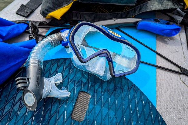 A snorkel mask and breather can come in handy for water-based fun in the sun, seen at Lake Baldwin Park on Wednesday, May 31, 2023. (Patrick Connolly/Orlando Sentinel)