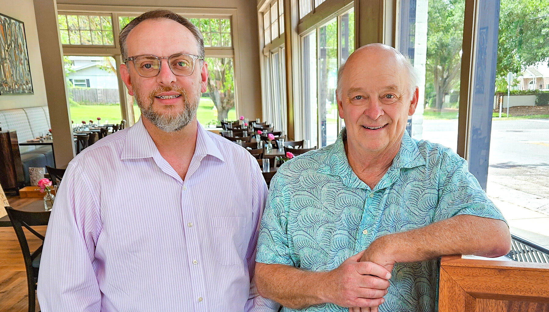 Hughes Brown and his father, Jerry, at the newly opened Oxford Place