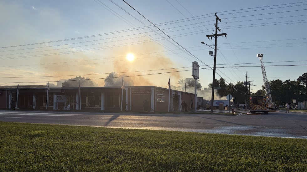 Crews say the Furniture Plus fire is now under control.