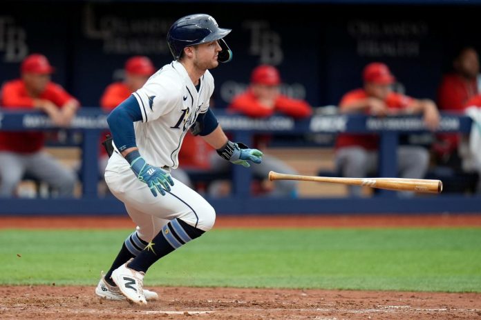 Tampa Bay Rays' Ben Williamson drops his bat after his RBI single off Los Angeles Angels pitcher Drew Pomeranz during the seventh inning of a baseball game Sunday, May 31, 2026, in St. Petersburg, Fla. (AP Photo/Chris O'Meara)