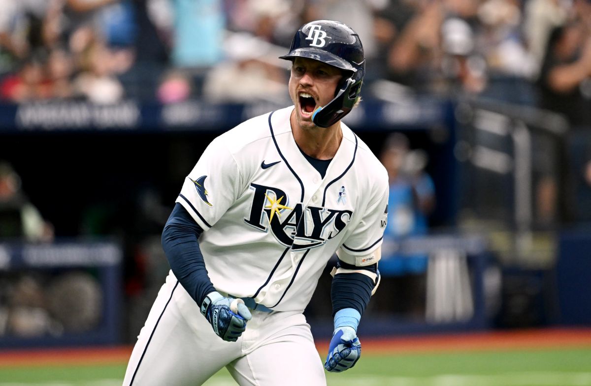 Tampa Bay Rays' Jonny DeLuca celebrates after his two-run home run as he rounds the bases during the seventh inning of a baseball game against the Washington Nationals, Sunday, June 21, 2026, in St. Petersburg, Fla. (AP Photo/Jason Behnken)
