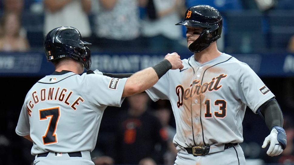 Detroit Tigers' Dillon Dingler (13) celebrates with Kevin McGonigle (7) after Dingler hit a two-run home run off Tampa Bay Rays pitcher Griffin Jax during the third inning of a baseball game Monday, June 1, 2026, in St. Petersburg, Fla. (AP Photo/Chris O'Meara)