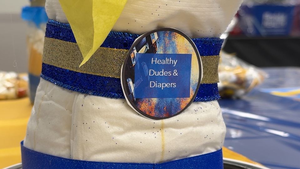 Part baby shower, part educational workshop, the event provided resources, advice, and hands-on lessons for men preparing to welcome a new child into their lives. (Spectrum News/Ashley Engle)