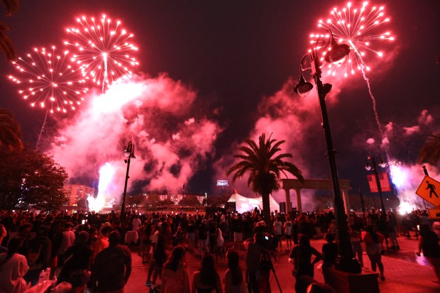Fireworks light up the sky during Red Hot & Boom at Crane's Roost in Altamonte Springs on Thursday, July 3, 2025. Thousands of spectators braved multiple lightning delays and rain most of the evening. (Stephen M. Dowell/Orlando Sentinel)