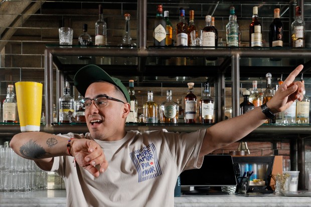 Jean Manuel Griman shows off some of his flair bartending skills at The Wilder in Fort Lauderdale on Thursday, May 28, 2026. Grimin will compete in the Cocktail Art Challenge, a flair bartending competition June 7-9 in Boca Raton. (Amy Beth Bennett / South Florida Sun Sentinel)