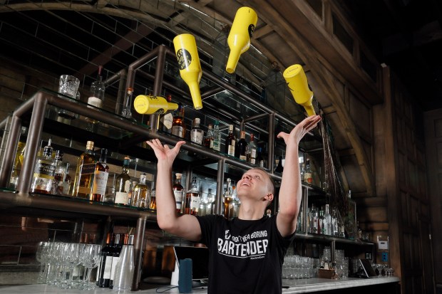 Nikolai Fomin shows off some of his flair bartending skills at The Wilder in Fort Lauderdale on Thursday, May 28, 2026. Fomin will compete in the Cocktail Art Challenge, a flair bartending competition June 7-9 in Boca Raton. (Amy Beth Bennett / South Florida Sun Sentinel)