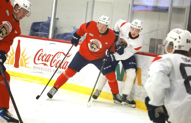Florida Panthers prospects Albert Wikman and Linus Eriksson listen to coaches during Panthers Development Camp at Baptist Health IcePlex in Fort Lauderdale on Monday, June 29, 2026. (Carline Jean/South Florida Sun Sentinel)