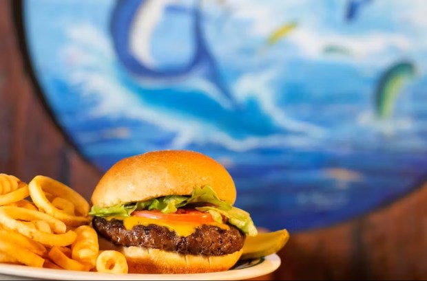 The $6.99 lunch special from Flanigan's includes a 10-ounce chargrilled burger with choice of potato or rice. (Flanigan's / Courtesy)