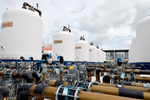 Water passes through the ion exchange tanks at the Prospect Lake Clean Water Center in Fort Lauderdale on June 10. The plant is expected to officially open in September. (Amy Beth Bennett/South Florida Sun Sentinel)