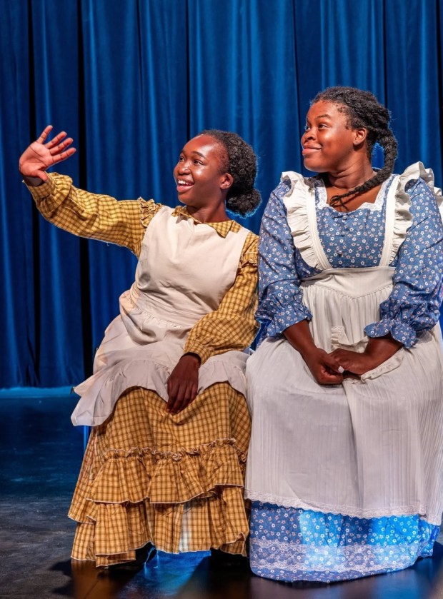 Sisters Nettie (Cassidy Joseph) and Celie (Brooklynn Miller) in "The Color Purple," playing at the Pompano Beach Cultural Center through July 3. (Trisha Rosales/Courtesy)