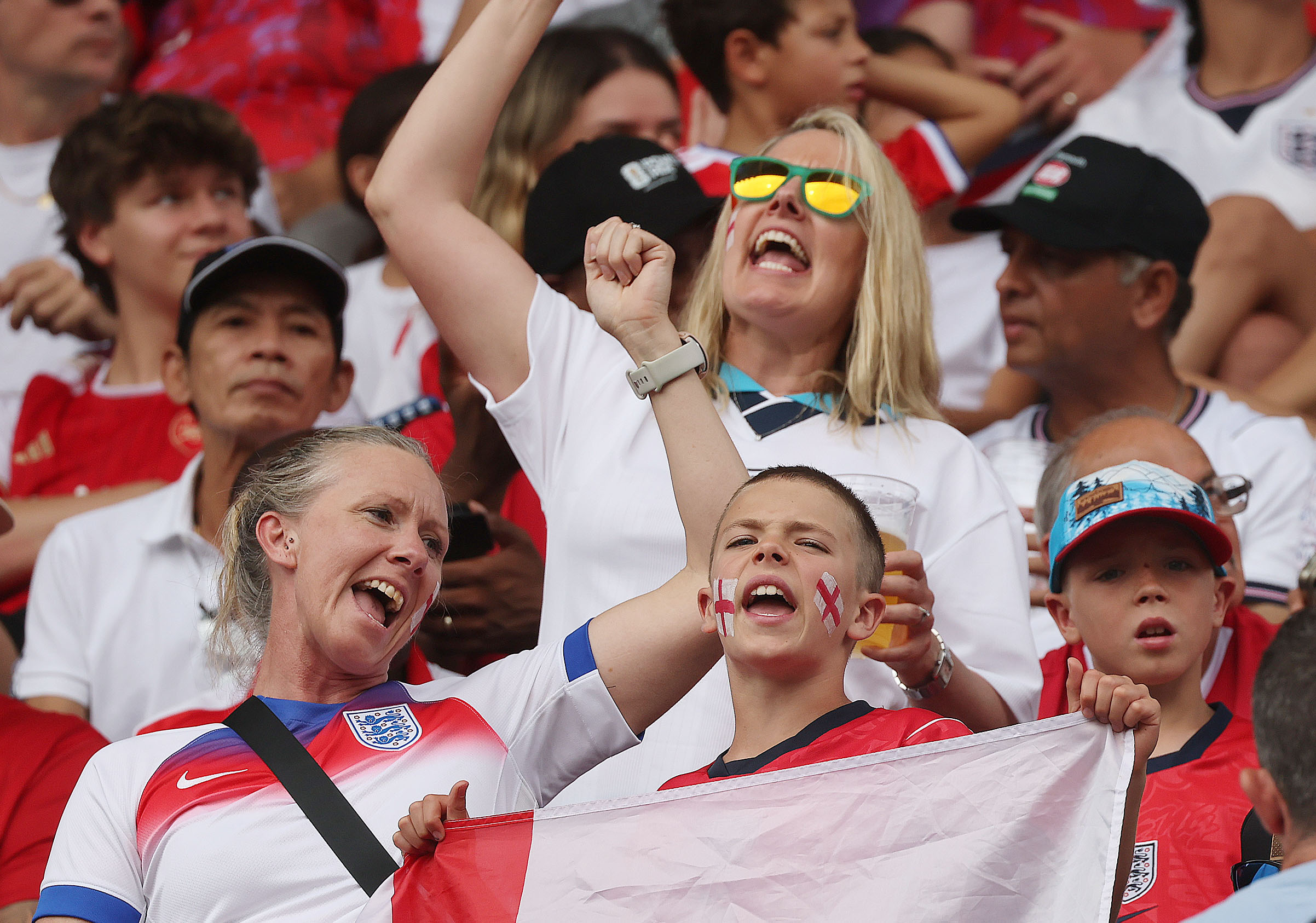 England fans cheer during the England versus Costa Rica pre-World...