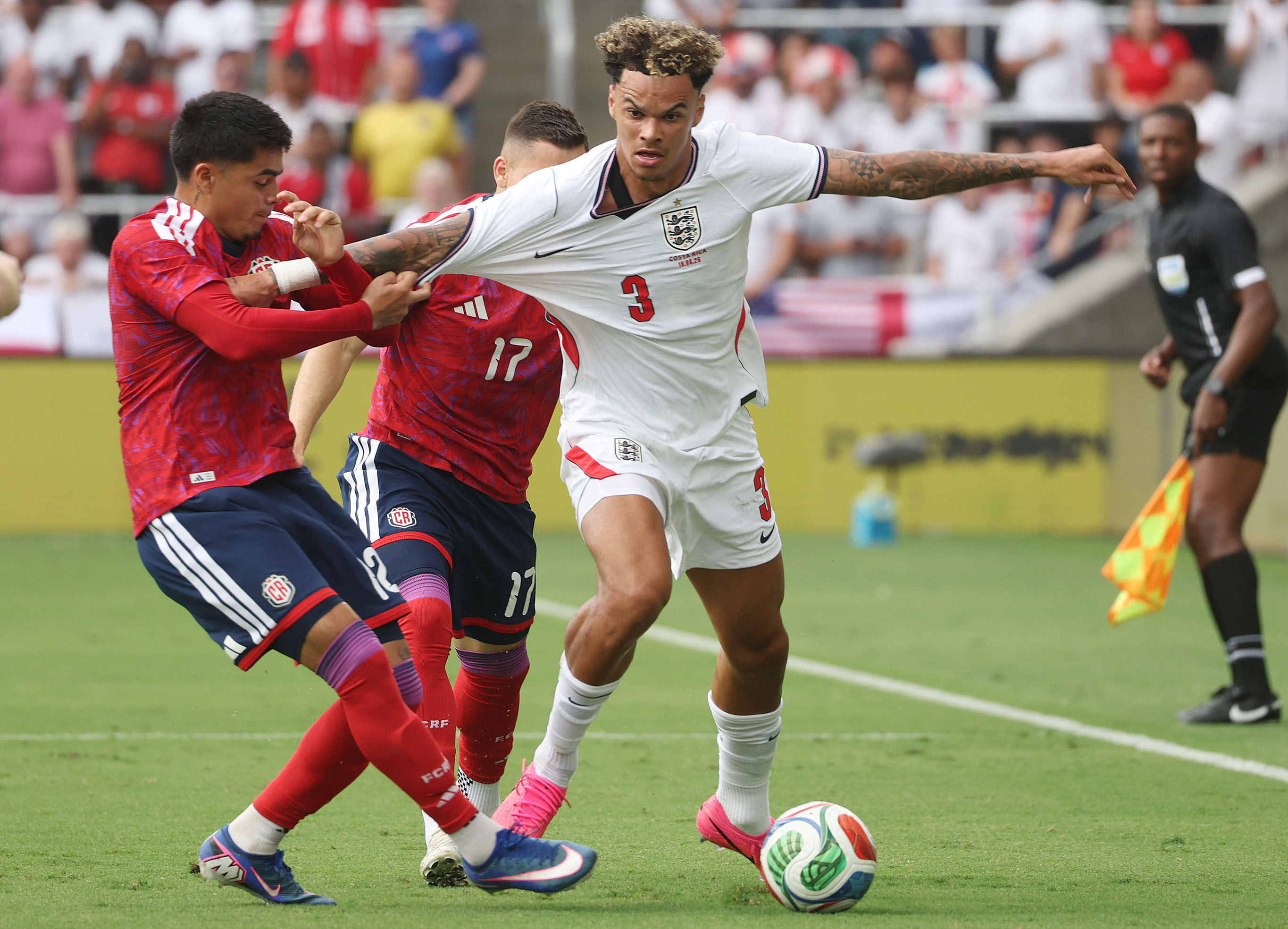 Costa Rica player Andrey Josue Soto Ruiz (left) pulls the...