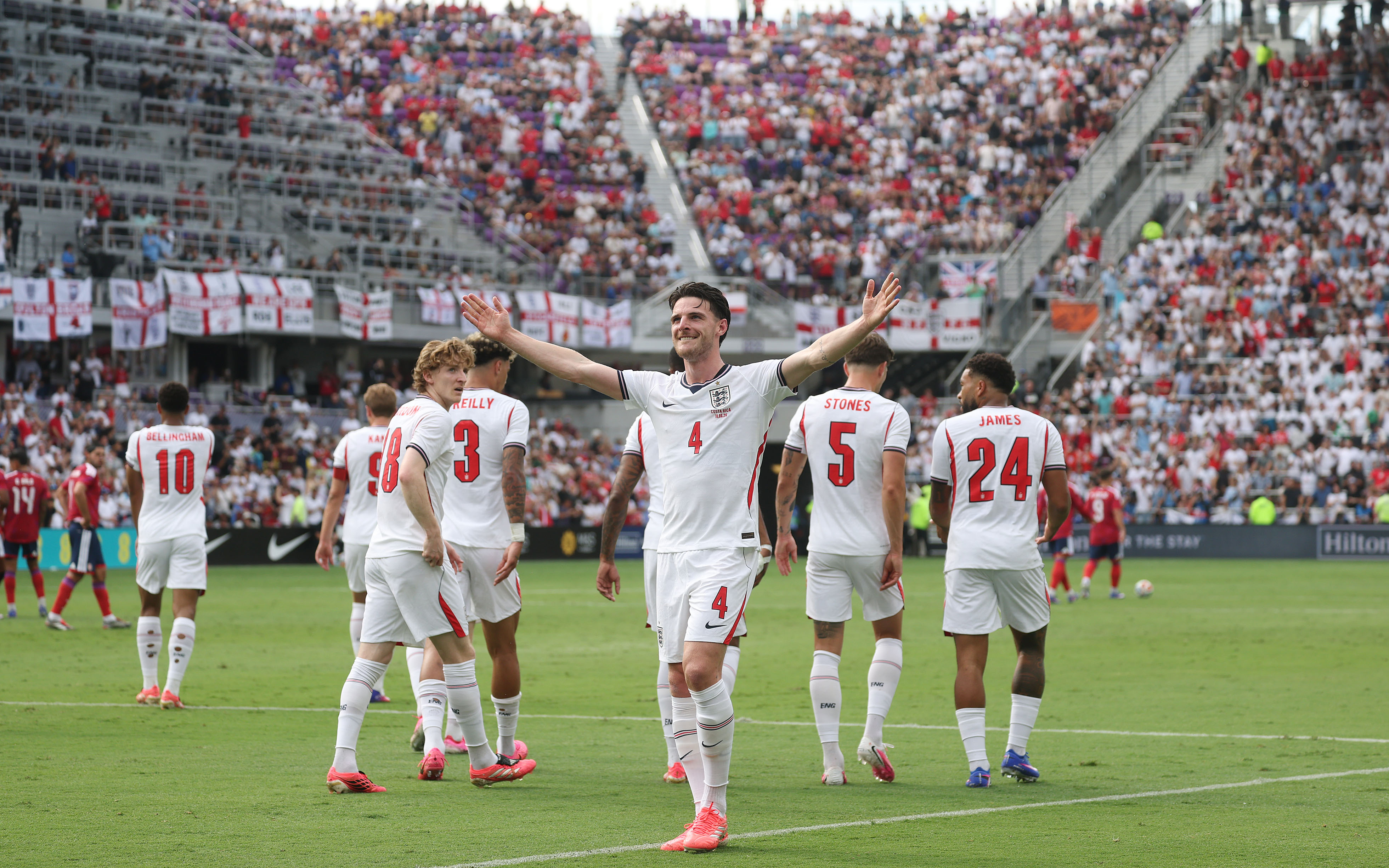 England player Declan Rice (4) cheers after a goal during...