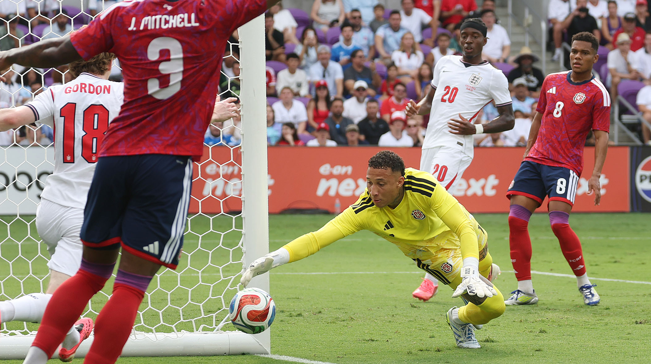 Costa Rica goalkeeper Patrick Gilmar Sequeira Mejias (bottom) stops a...