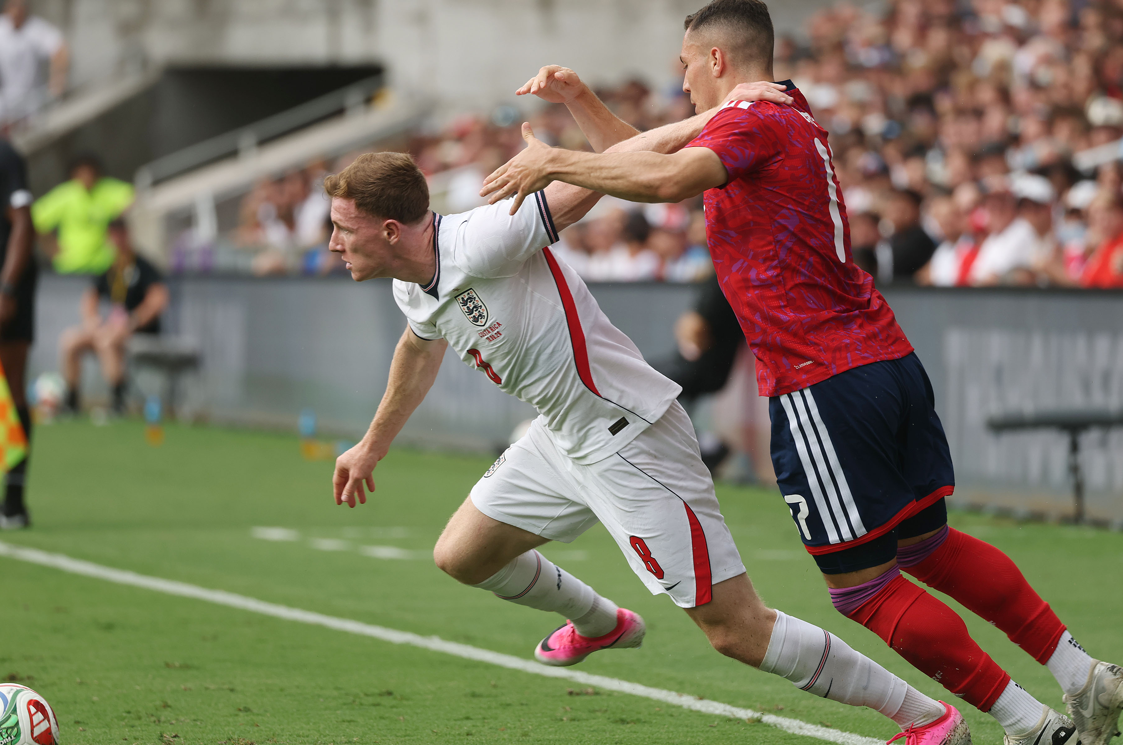 England player Elliot Anderson (left) battles Costa Rica player Carlos...