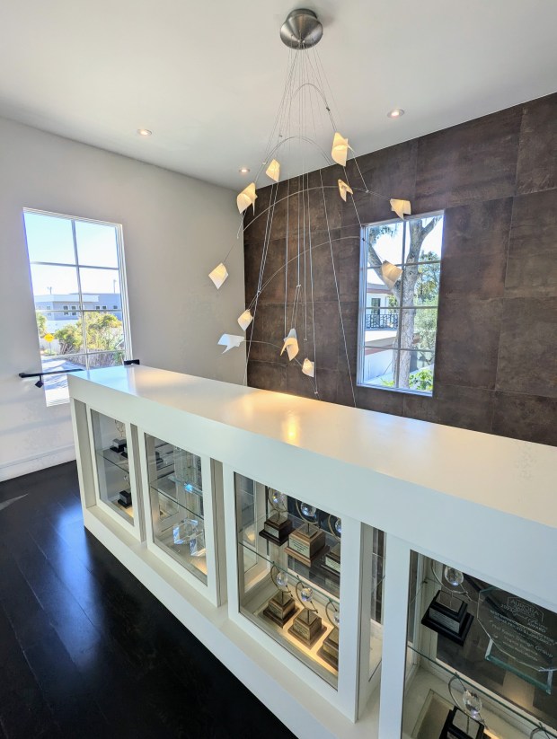 The two-story Fairbanks Avenue showroom features contemporary finishes that could adapt to another business without a total interior rebuild. (Handout from CrossMarc Services)