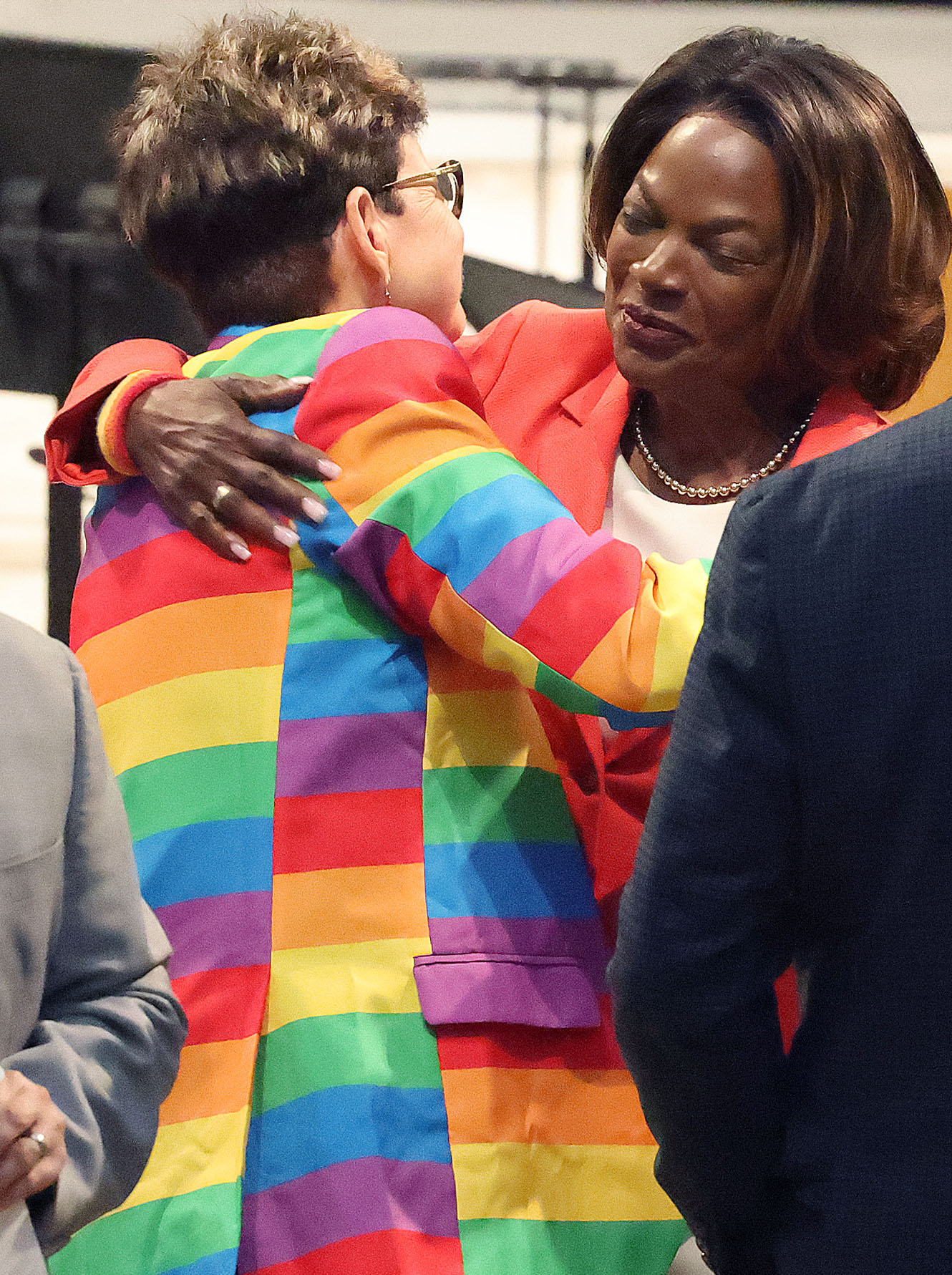 Orlando Commissioner Patty Sheehan (left) hugs former US Rep. Val...