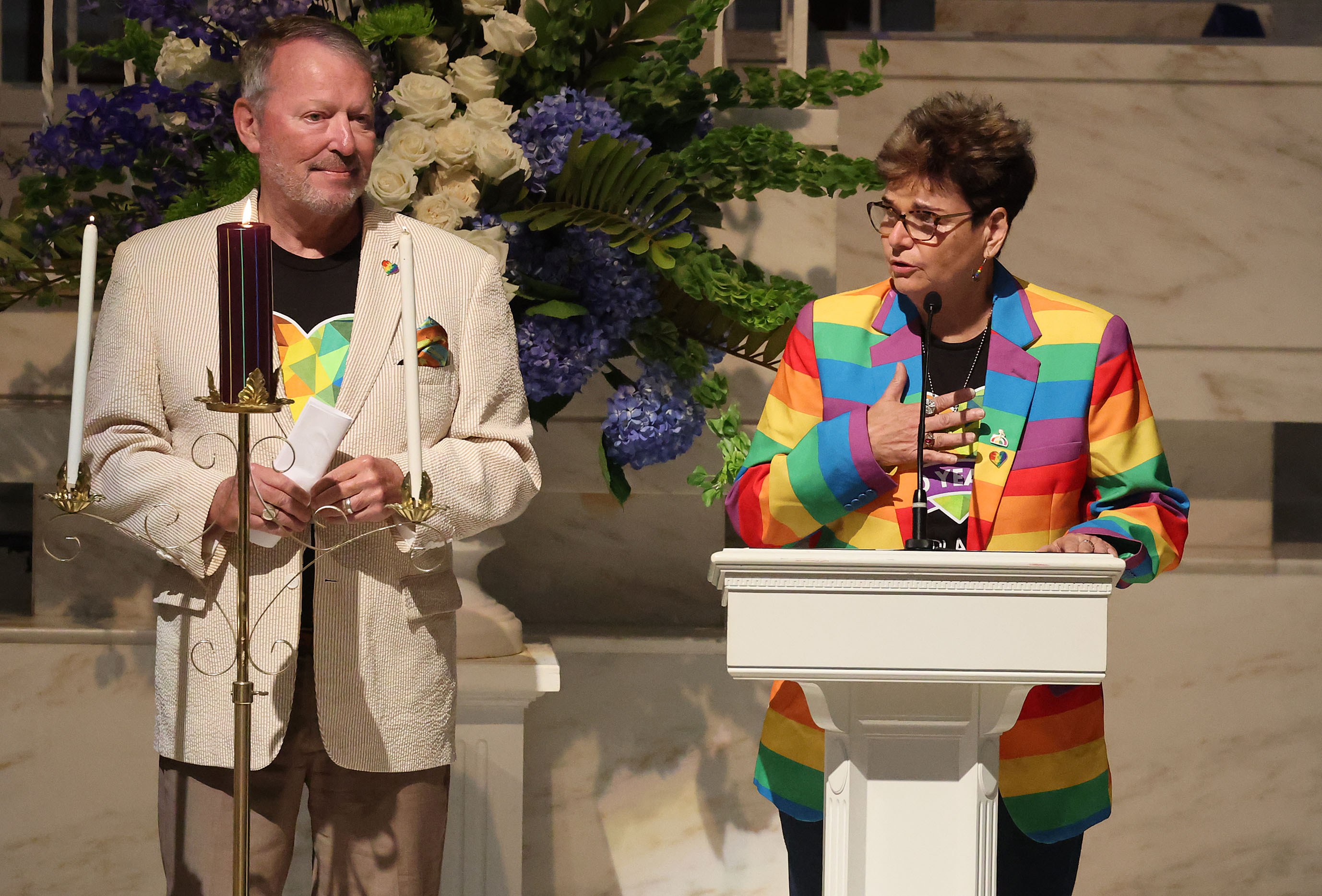 Orlando Mayor Buddy Dyer, left, and Orlando Commissioner Patty Sheehan...