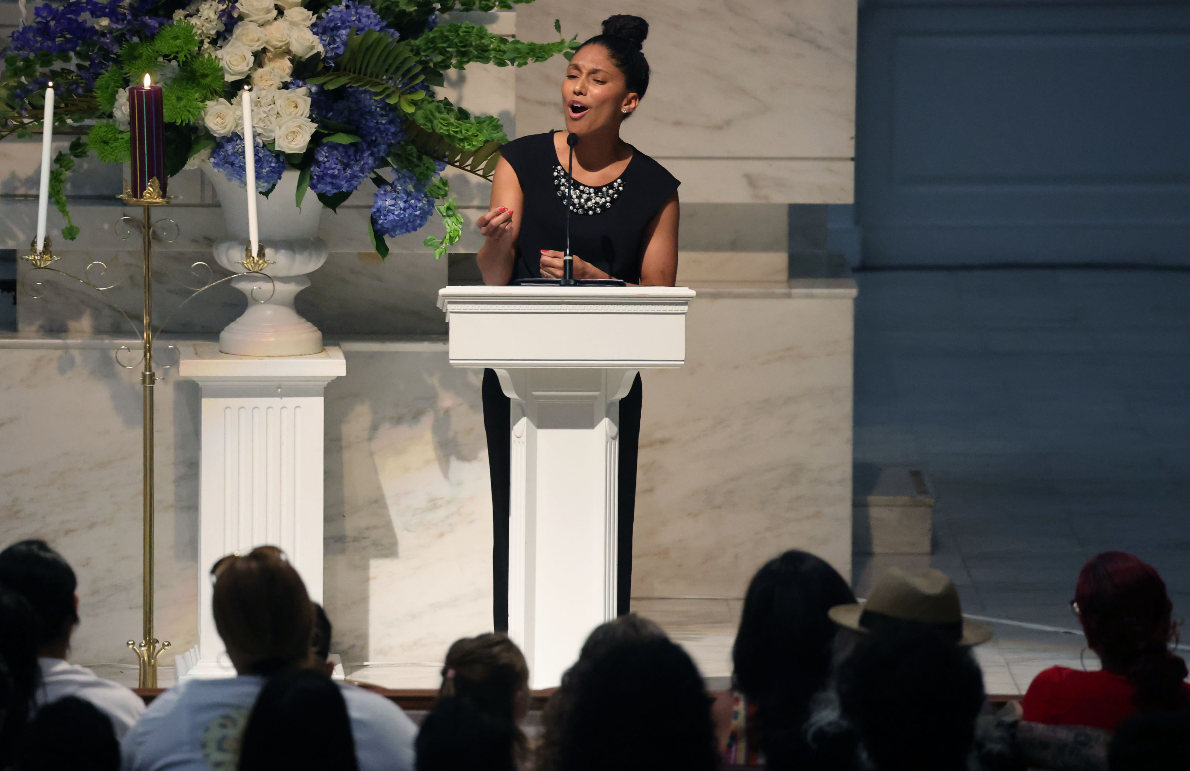 City of Orlando Poet Laureate Camara Gaither speaks during the...