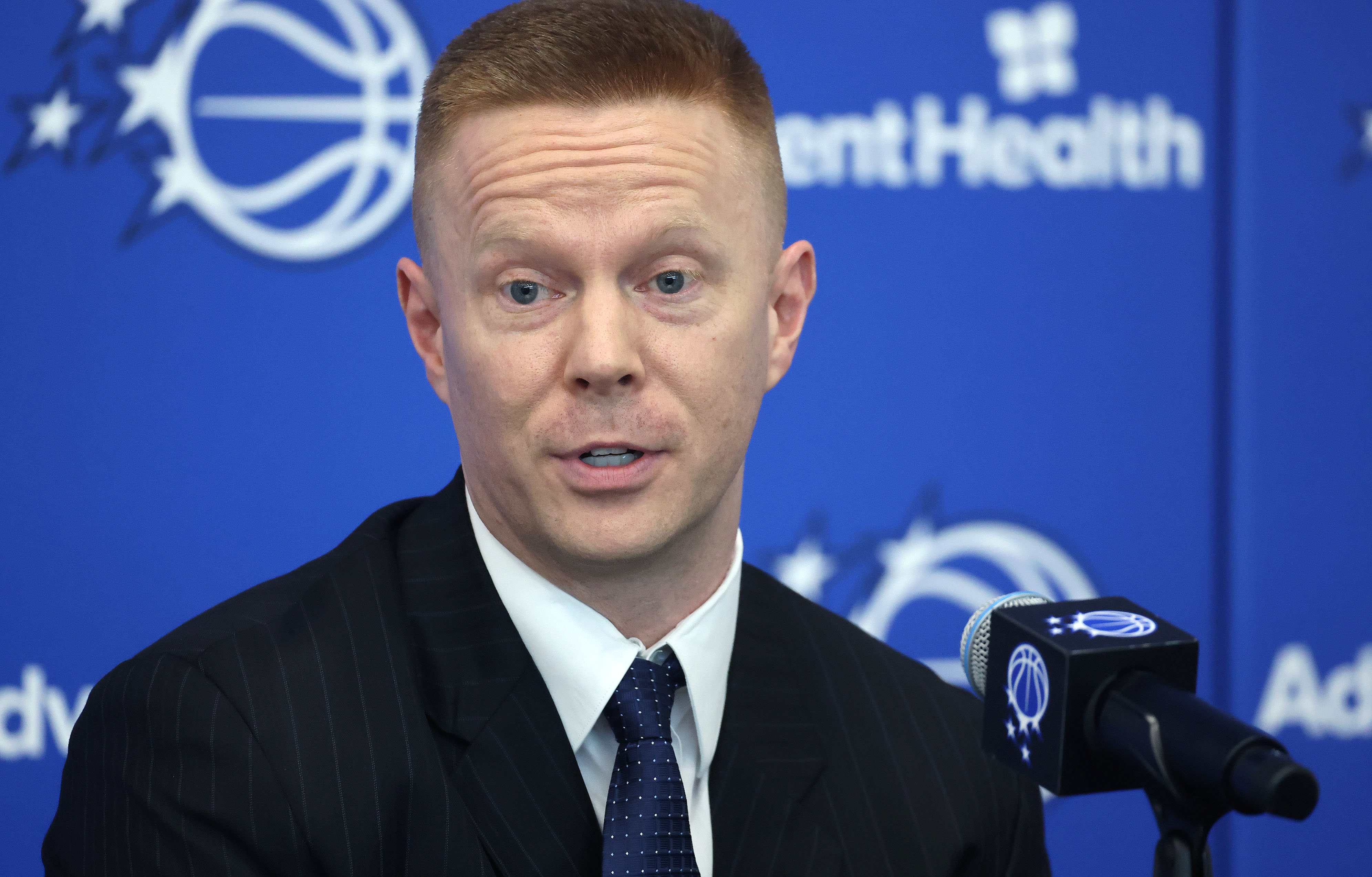 New Orlando Magic head coach Sean Sweeney speaks during a...