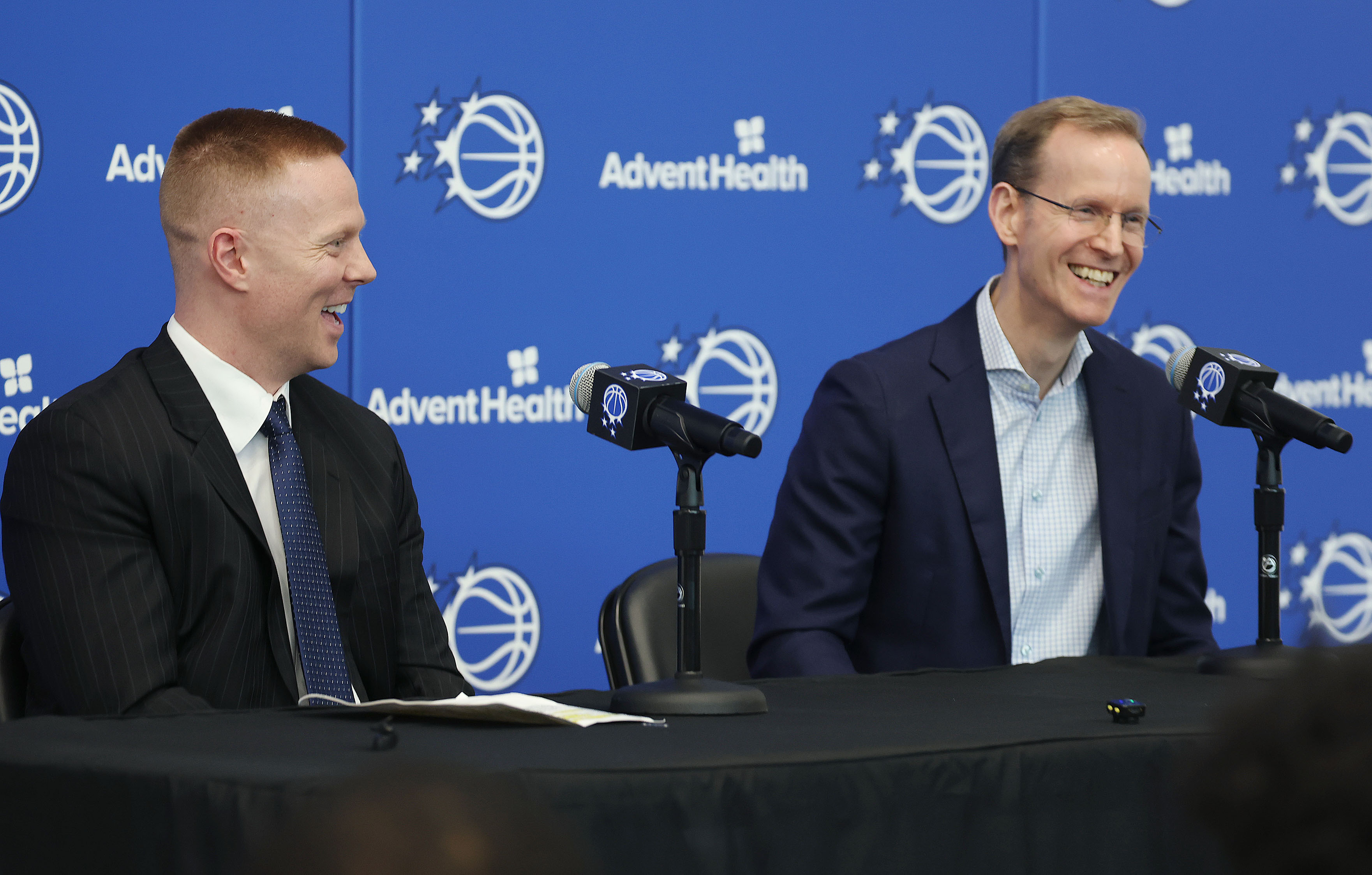New Orlando Magic head coach Sean Sweeney, left, and Magic...