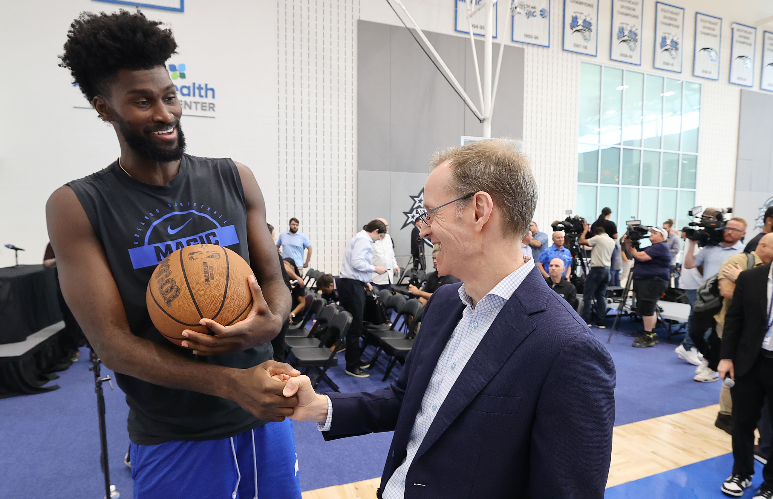 Orlando Magic forward Jonathan Isaac and Magic president Jeff Weltman...