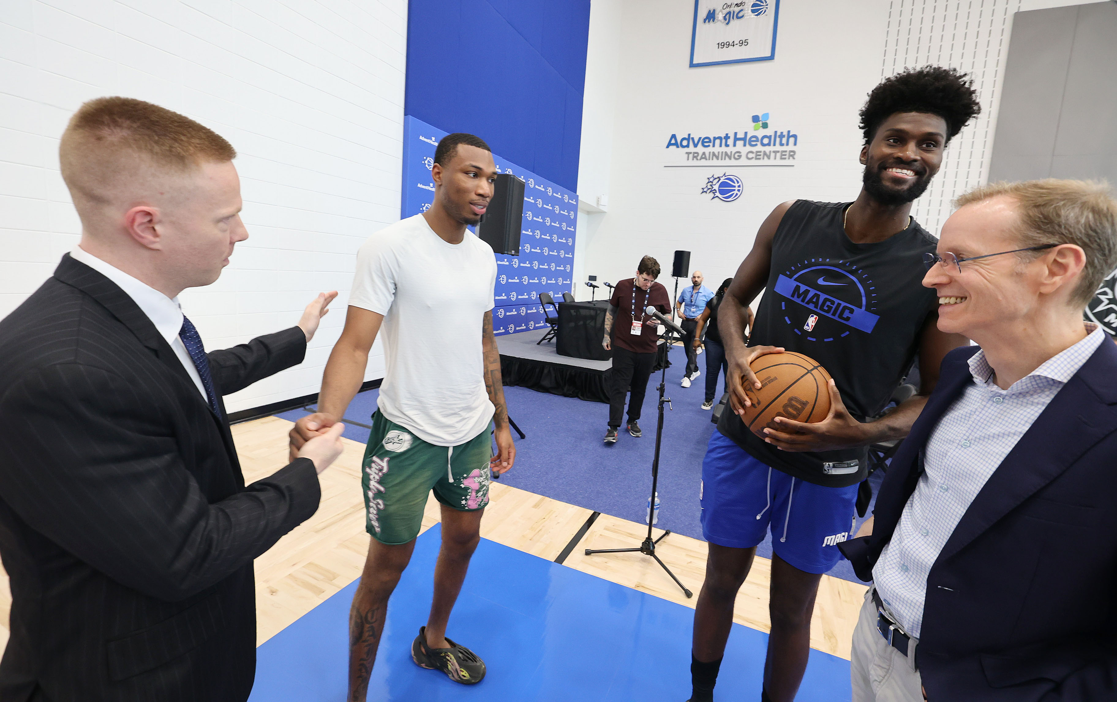 From left: new Orlando Magic head coach Sean Sweeney, Magic...
