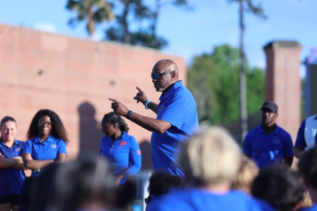 Florida track and field coach Mike Holloway addresses his athletes during the Pepsi Relays on April 4, 2026 at Percy Beard Track at James G. Pressly Stadium in Gainesville. (Rachel Rusch / UF's University Athletics Association Communications)