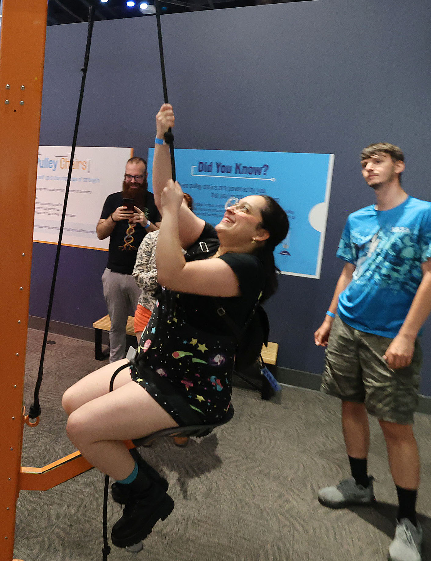 Guests enjoy an interactive exhibit during Orlando Science Centerâs Science...