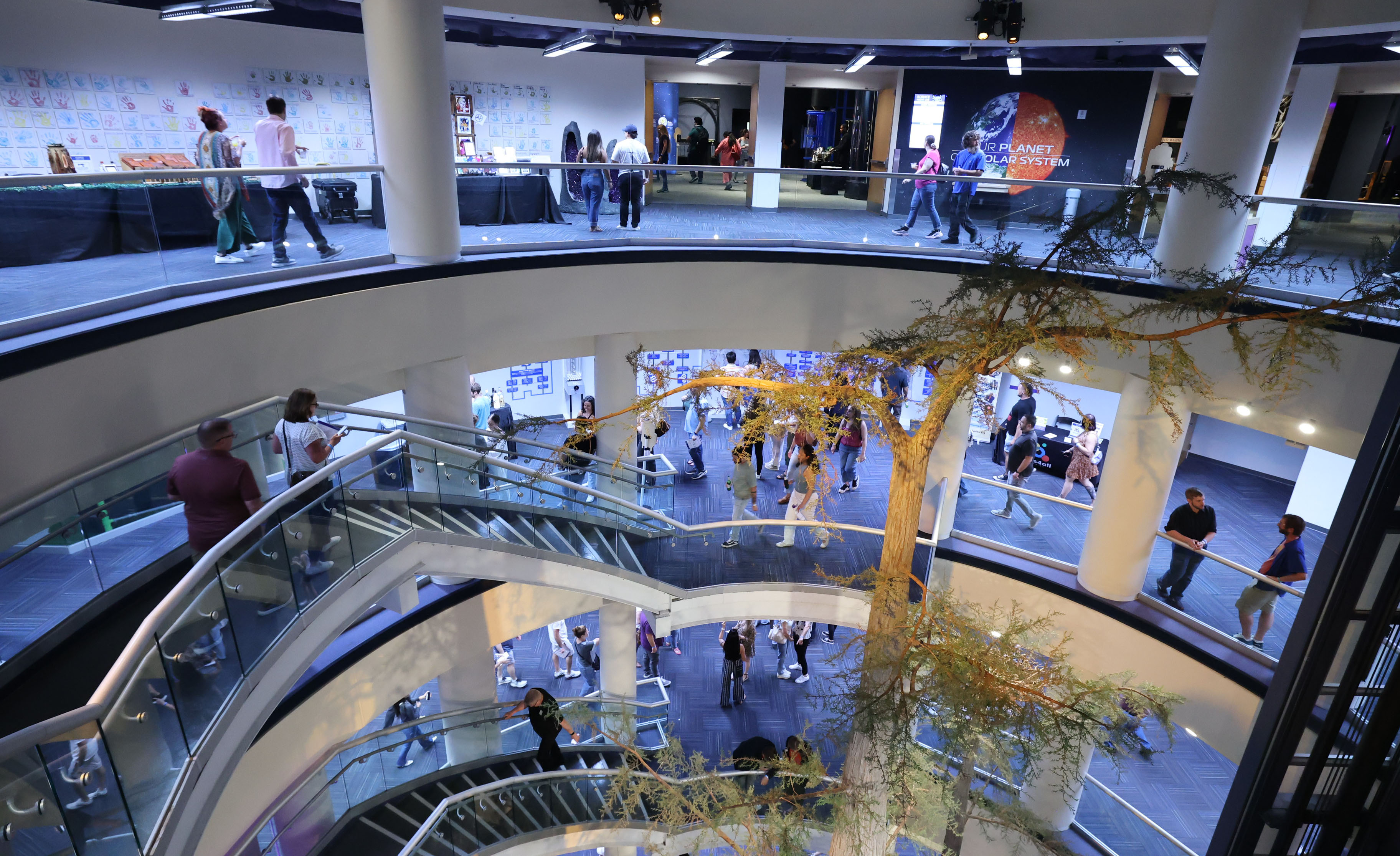Guests on multiple levels enjoy events during Orlando Science Centerâs...
