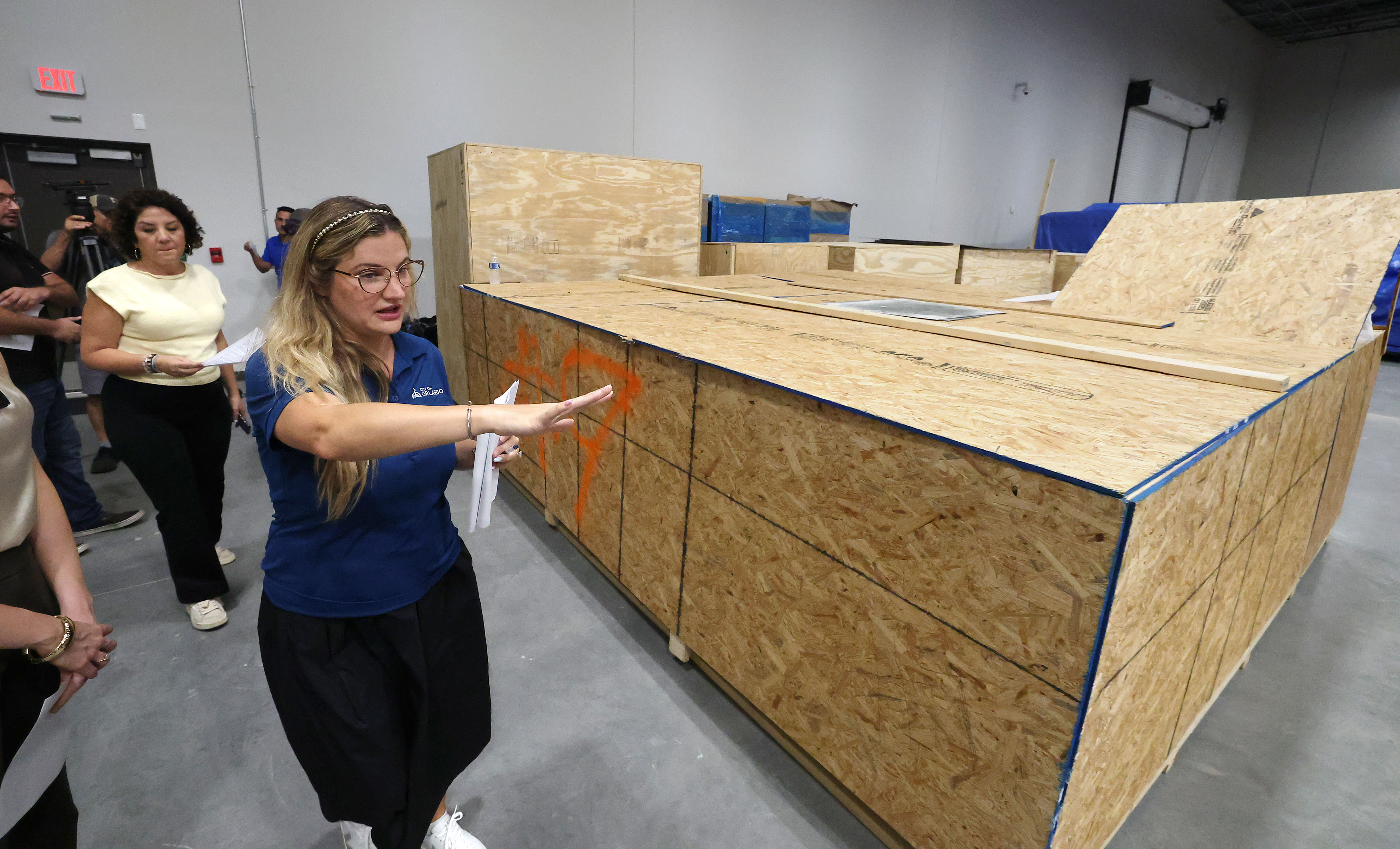 Ashley Papagni, with City of Orlando, leads journalists on a...