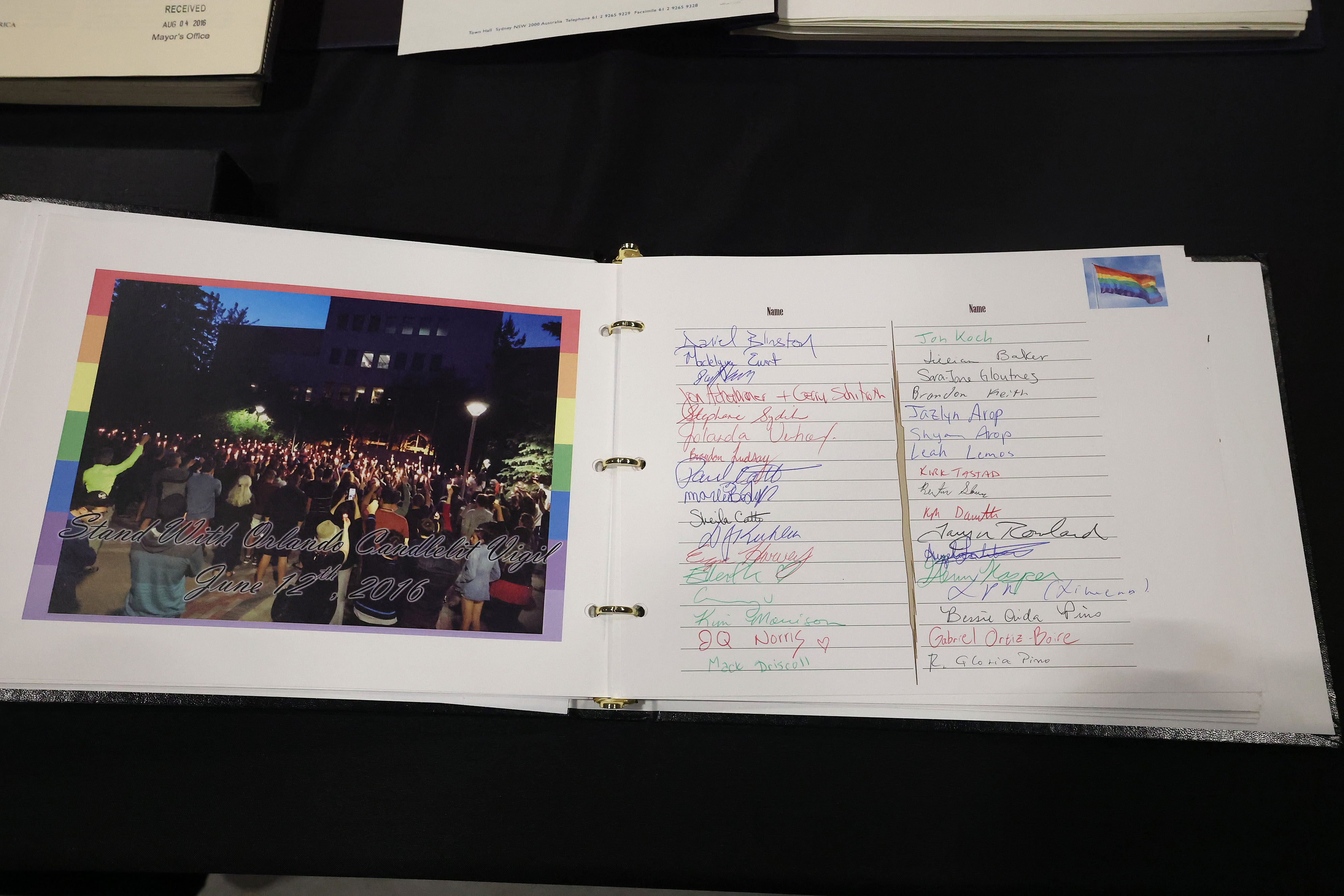 A guest book is among artifacts and items collected after...