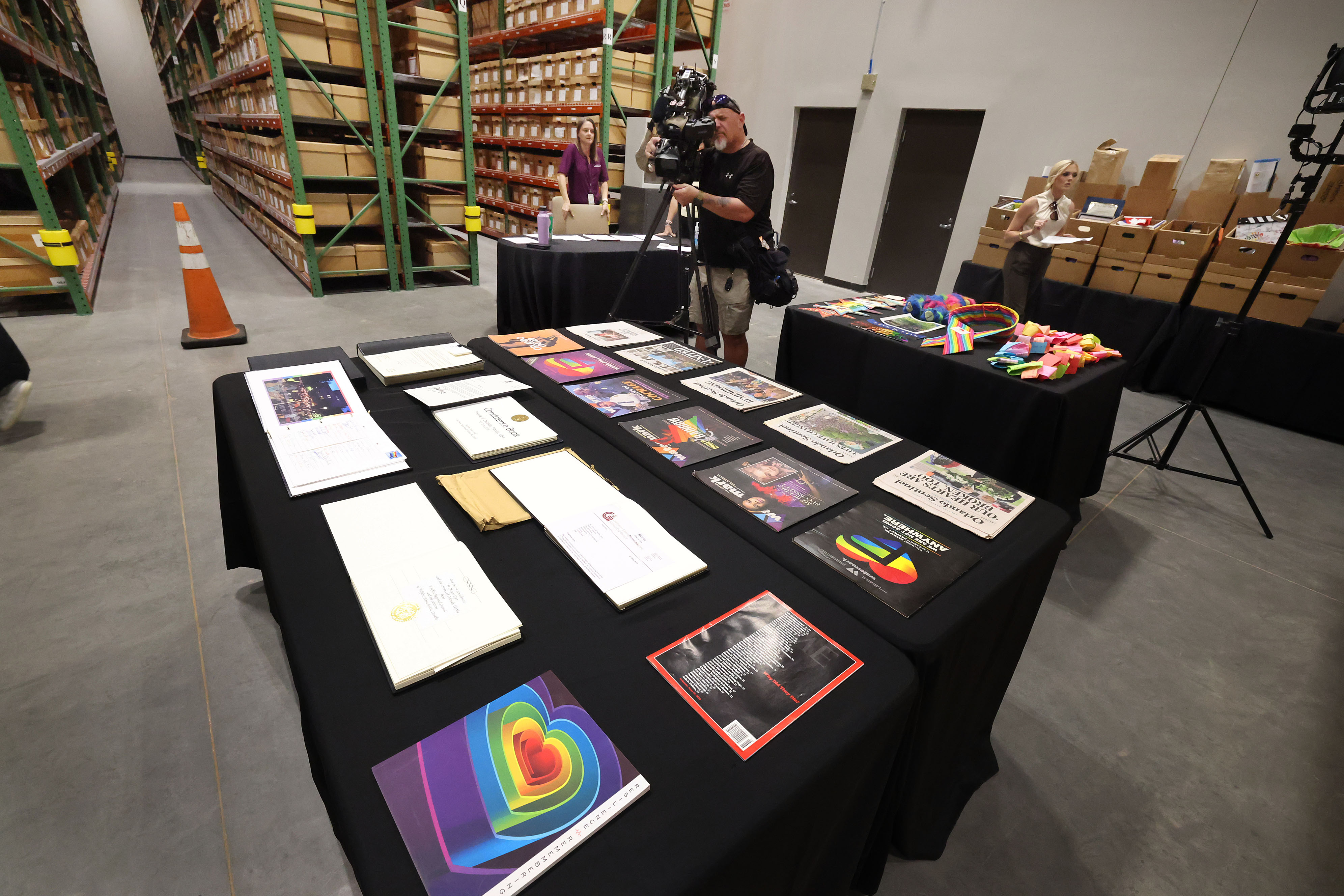 Journalists film artifacts and items collected after the Pulse tragedy....