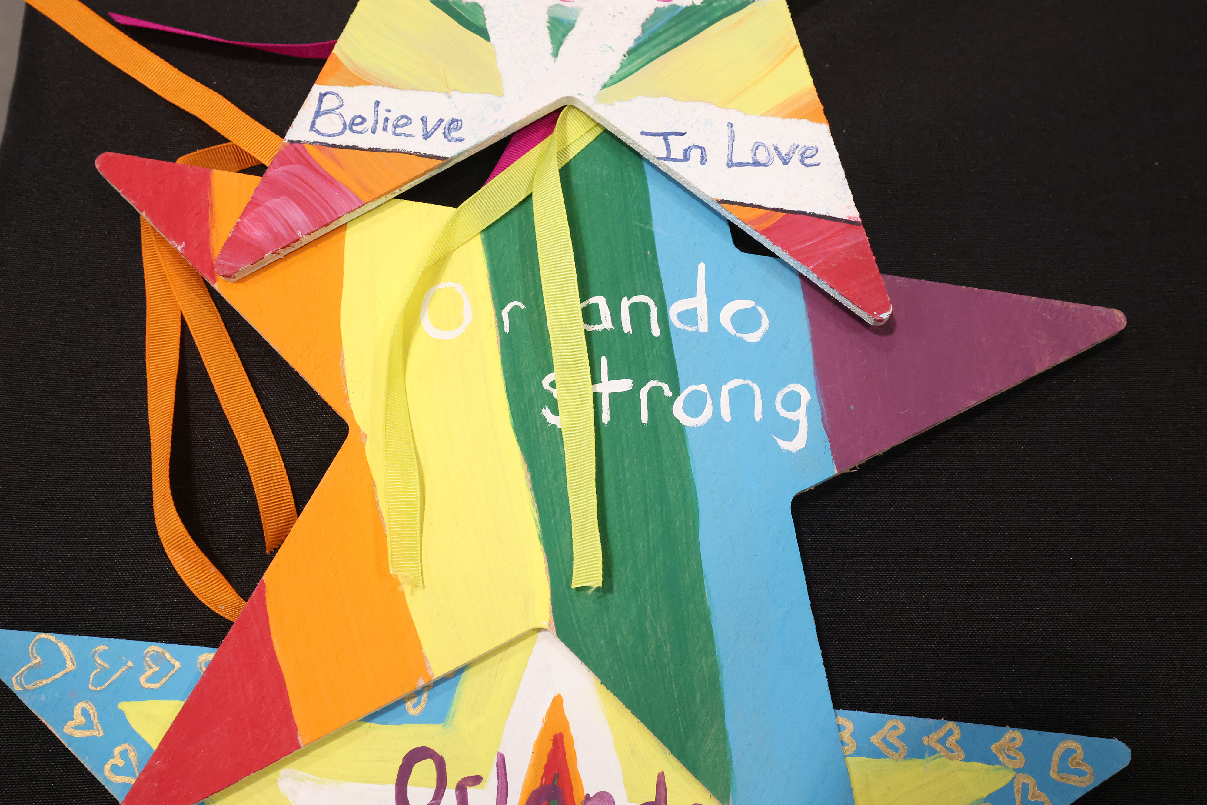 Painted star decorations with messages are among artifacts and items...