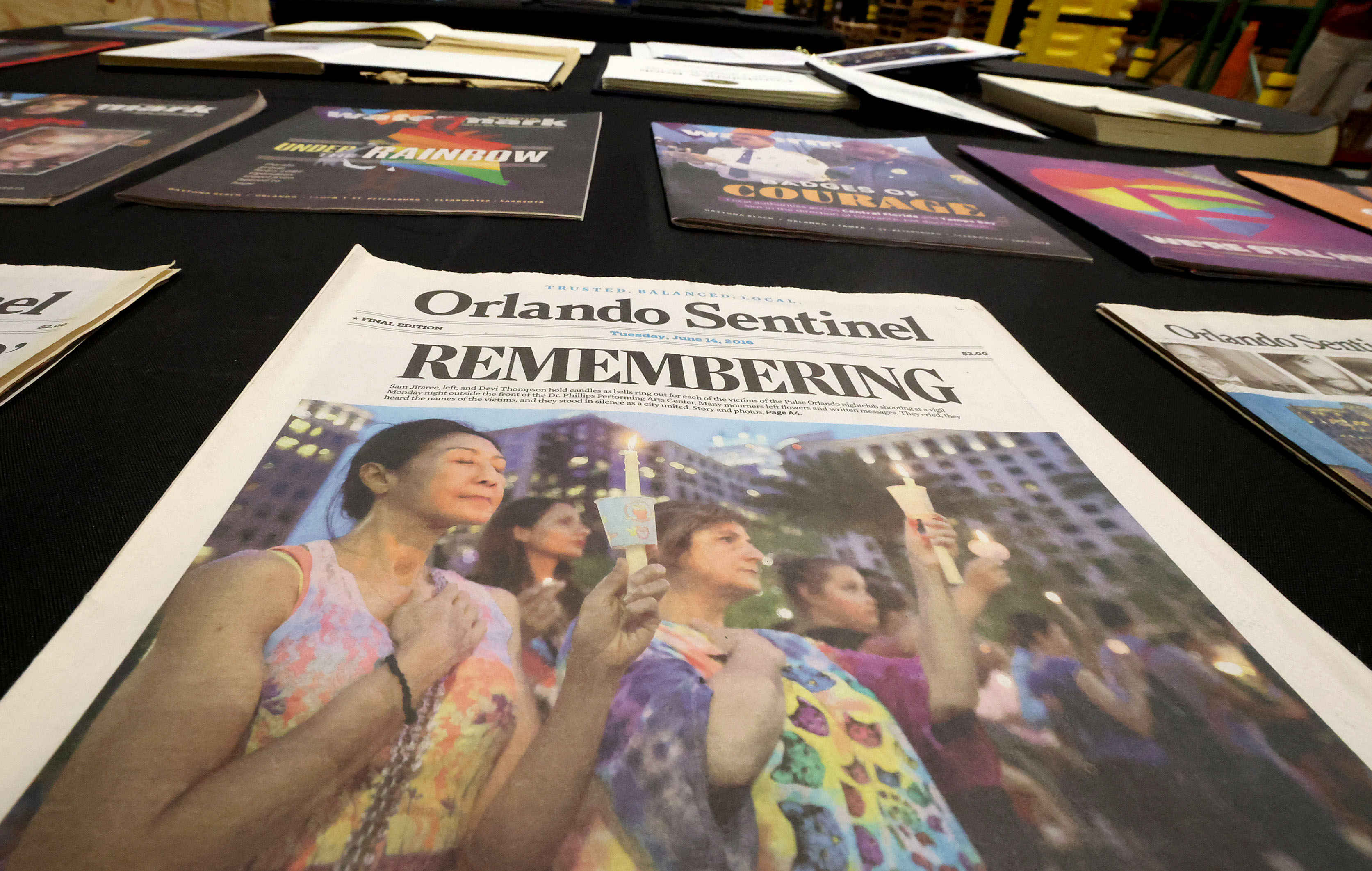 Front pages of the Orlando Sentinel are among artifacts and...