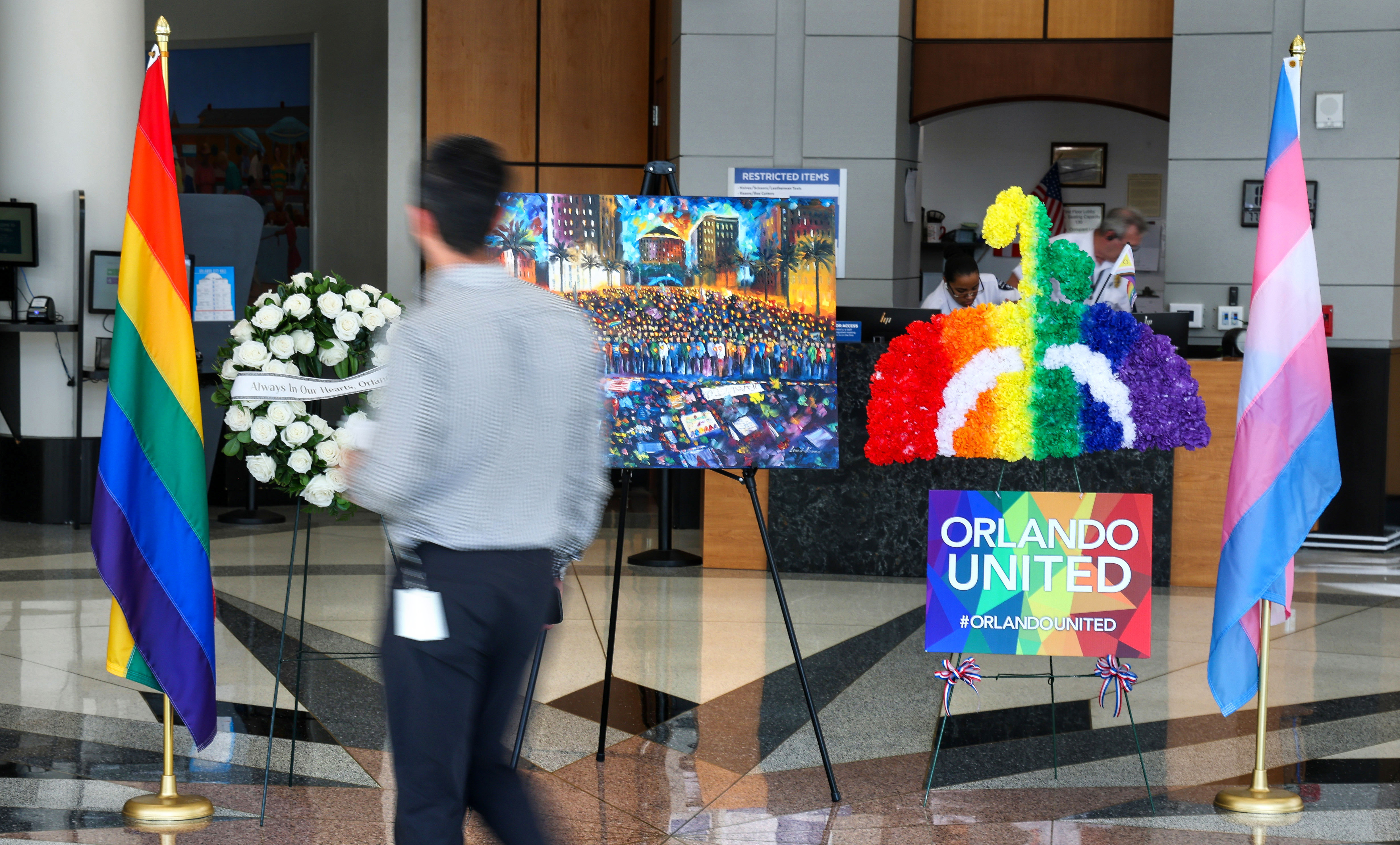 REMEMBERING PULSE â A memorial of flowers and flags in...
