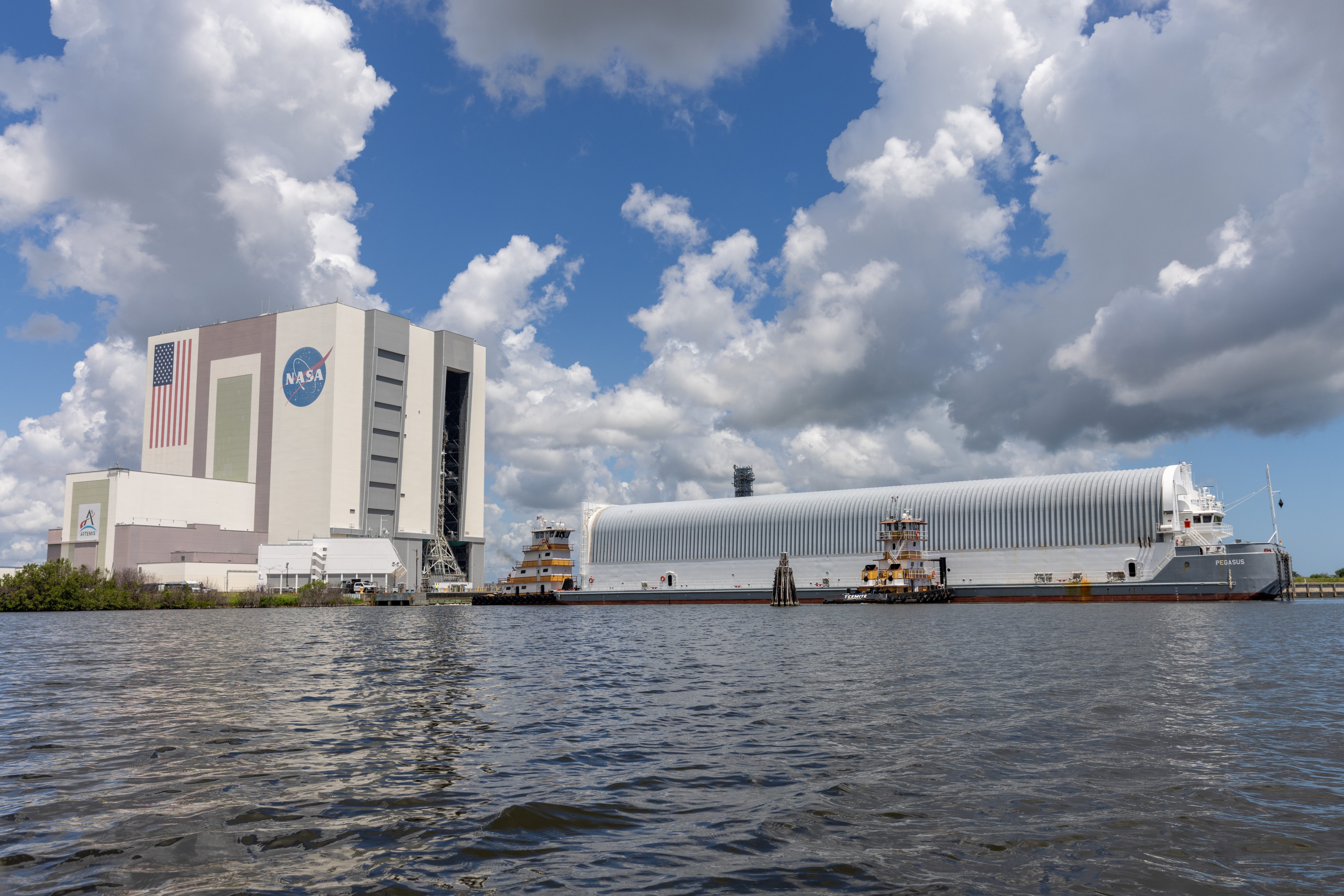 NASA's Pegasus barge docks at the Launch Complex 39 turn...