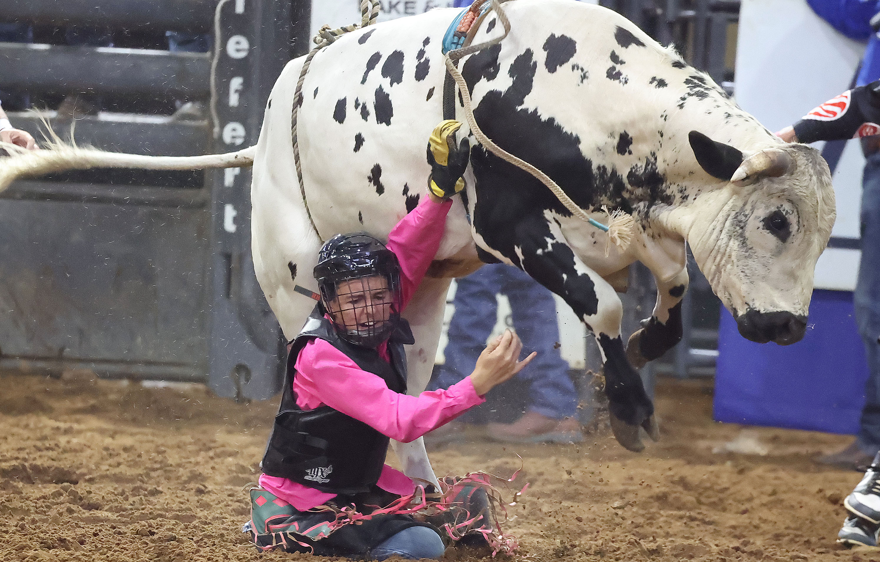 Dallen Baucom falls off a bull during the Silver Spurs...