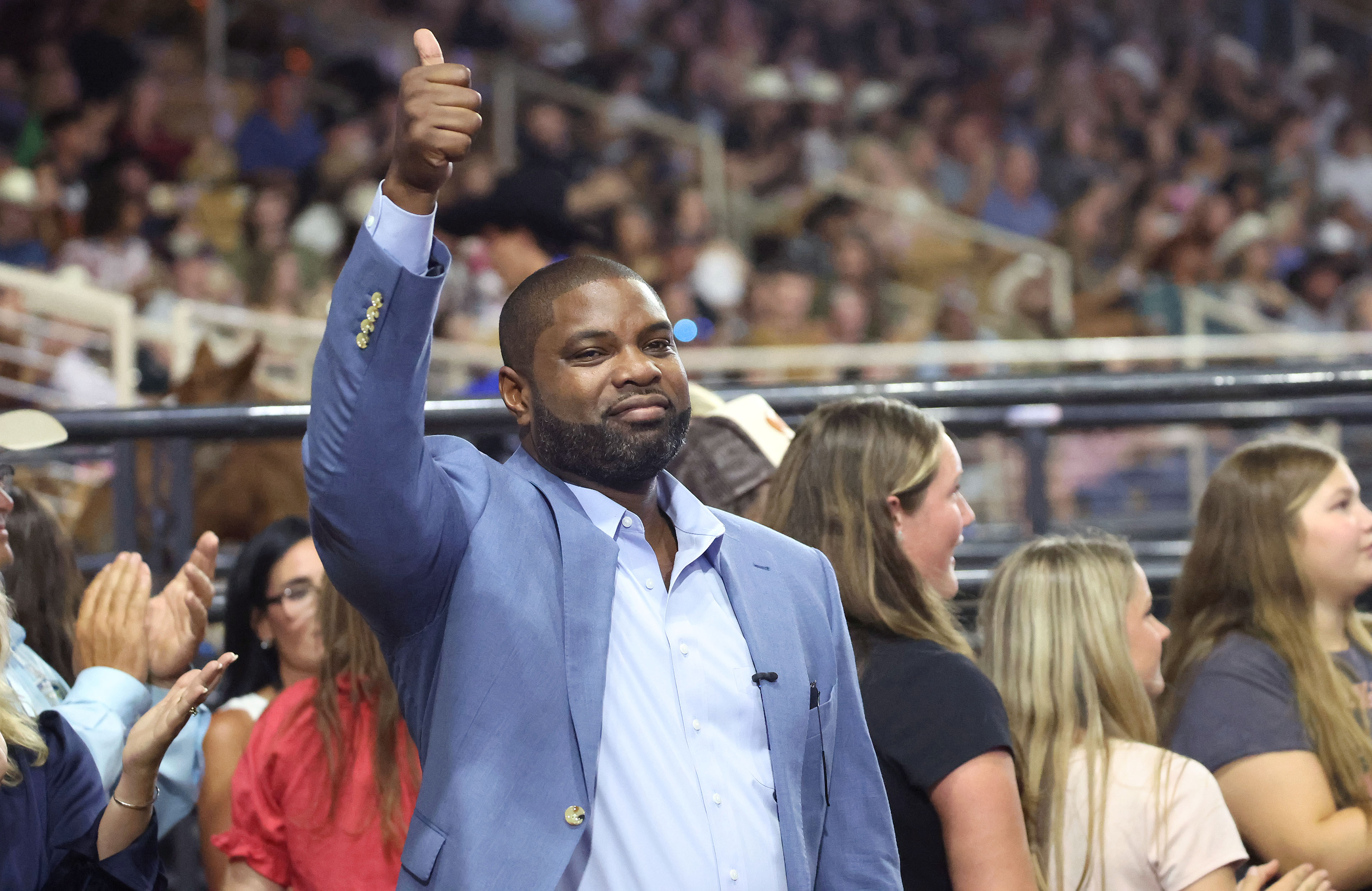U.S. Rep. Byron Donalds waves to the crowd as he...